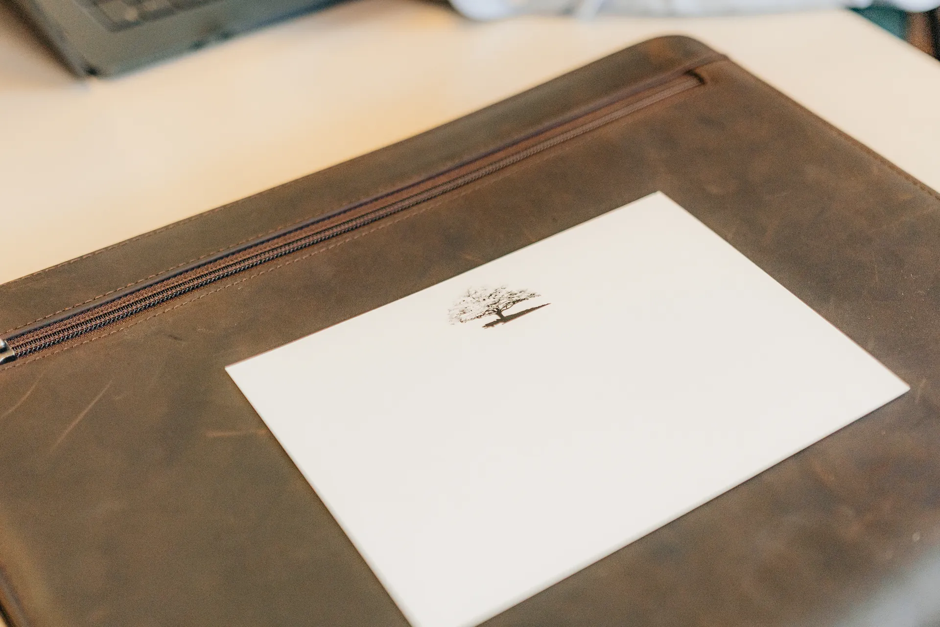 A lease and portfolio on a Dogwood desk